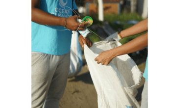 Volunteers participating in a community cleanup event during Earth Month.