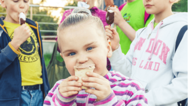 Child receiving health checkup from doctor under new childhood obesity treatment guidelines in Canada