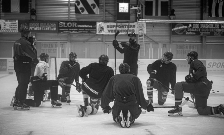 Firefighters playing hockey during the Esquimalt Memorial Tournament to support mental health awareness.