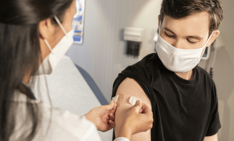 man receiving MMR vaccine to prevent measles