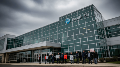 Health PEI building reflecting controversy over interim executive pay and public sector salaries