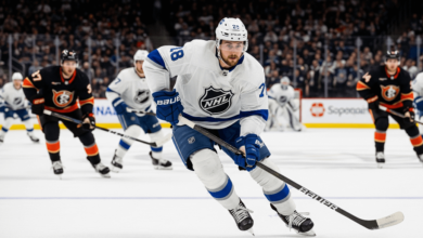 Professional hockey player skating with speed during a competitive NHL-style game