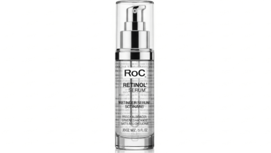 ROC Retinol serum bottle with clear packaging on white background