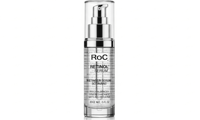 ROC Retinol serum bottle with clear packaging on white background