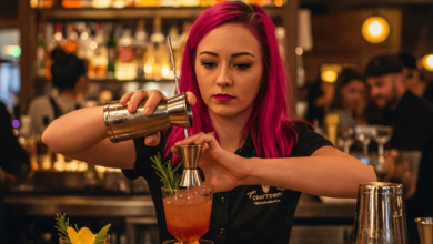 Bartender preparing a craft cocktail in an award-winning Vancouver bar
