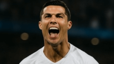 Cristiano Ronaldo smiling and celebrating on the field, enjoying a triumphant moment with Al-Nassr fans during a Saudi Pro League match.