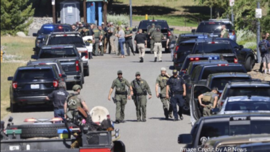 Firefighters responding near Canfield Mountain in Coeur d’Alene, Idaho, where a sniper attack occurred during a wildfire emergency