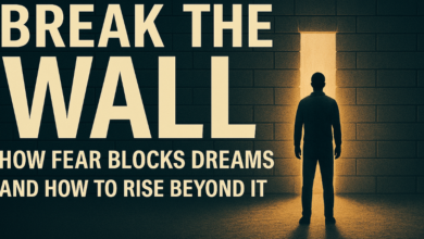 A person facing a symbolic wall with light shining from behind, illustrating how fear blocks dreams and the inner strength needed to break through