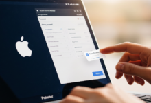 Person using a secure password manager to protect Apple account from data breaches
