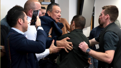 Senator Alex Padilla being handcuffed by federal agents during DHS briefing led by Kristi Noem