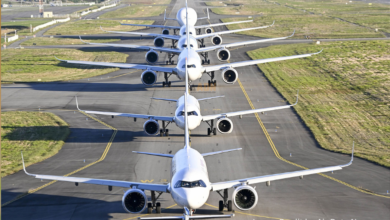 Airbus and Boeing commercial aircraft parked at airport gates in 2025
