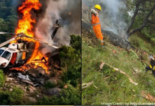 Wreckage of the helicopter crash near Kedarnath, India, surrounded by mist and trees