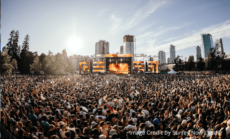 Large crowd enjoying live EDM performance at FVDED in the Park 2025 in Holland Park, Surrey