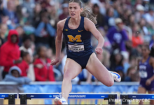 Savannah Sutherland clears a hurdle during her record-breaking NCAA 400m race