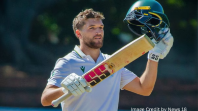 Wiaan Mulder raising his bat after scoring 367 runs in a historic Test match against Zimbabwe*