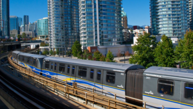 SkyTrain Expansion in Vancouver with trains running through a modern urban skyline