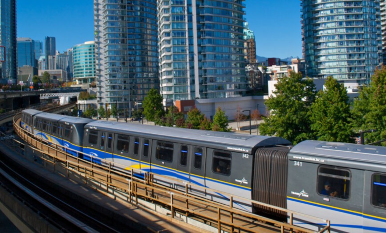 SkyTrain Expansion in Vancouver with trains running through a modern urban skyline