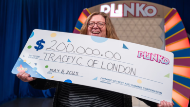 Canada Day Lotto Max Win celebration as Ontario woman holds $200,000 Plinko prize cheque