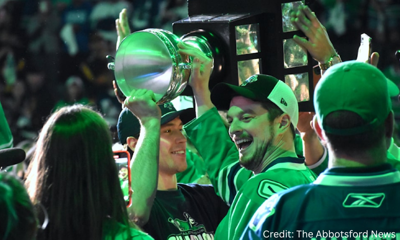 Abbotsford Canucks players celebrating Calder Cup win with fans and confetti inside Abbotsford Centre