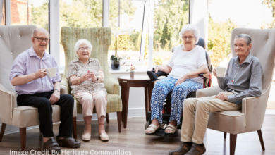 Seniors sitting in their living room after getting approved for BC rent assistance
