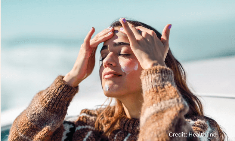Close-up of woman applying moisturizer to protect skin in harsh Canadian winter