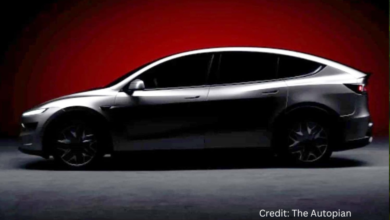 Side view of Tesla Model Y L showcasing third-row seats and family-focused design