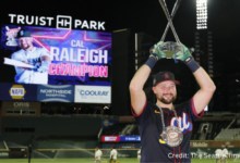 Cal Raleigh celebrates after winning the 2025 Home Run Derby, making history as the first catcher to claim the title