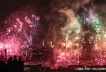 Bastille Day 2025 Eiffel Tower illuminated with fireworks and drones lighting up the Paris sky