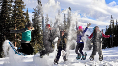 "Group of Canadians participating in cold-weather workouts like ice yoga and snowshoeing in a snowy outdoor setting"