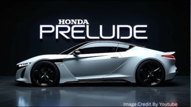 Side profile of the 2026 Honda Prelude Prototype showing its sleek hybrid coupe design at an auto show
