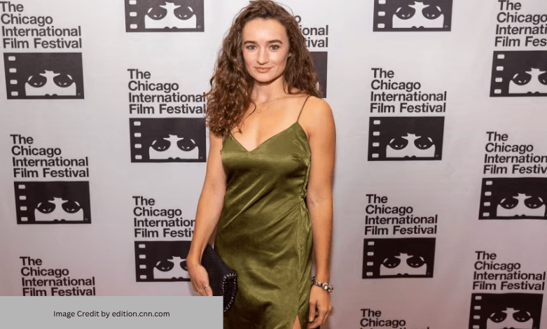 Kelley Mack smiling at a red carpet event before her diagnosis