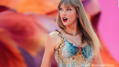 Fans celebrating Taylor Swift’s big-screen release party inside a packed movie theater