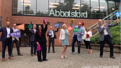 Community members gather at Abbotsford gallery opening, enjoying art and conversation