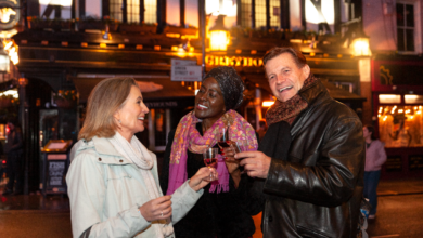 Friends enjoying a night gathering in a city street scene representing Hidden & Underground Events in Metro Vancouver