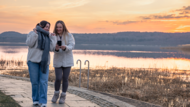 Two women enjoying a sunset waterfront walk during Vancouver’s Sunset Walk & Chill Events