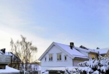 Snow-covered BC home during a winter storm