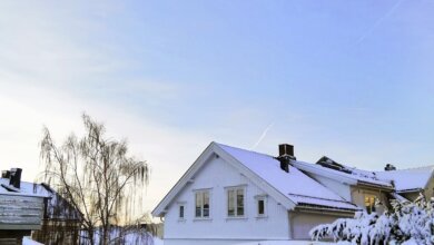 Snow-covered BC home during a winter storm