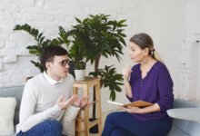 Mental health counselling session with a client and therapist