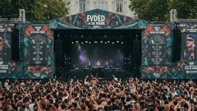 Crowd enjoying Tiësto's performance at FVDED in the Park 2025 in Surrey's Holland Park during the vibrant EDM festival.