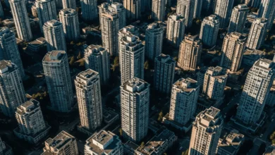 Aerial view of Metro Vancouver skyline showing dense residential buildings, representing rent prices in June 2025