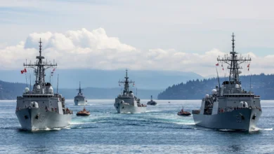 Canadian, U.S., and Mexican naval ships conducting joint drills near Esquimalt Harbour during Exercise TRIDENT FURY