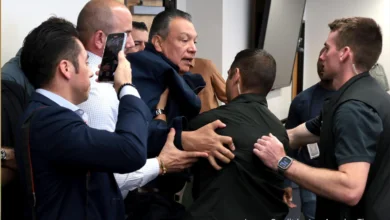 Senator Alex Padilla being handcuffed by federal agents during DHS briefing led by Kristi Noem