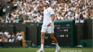 Marin Čilić pumps his fist after winning a crucial point against Jack Draper at Wimbledon 2025