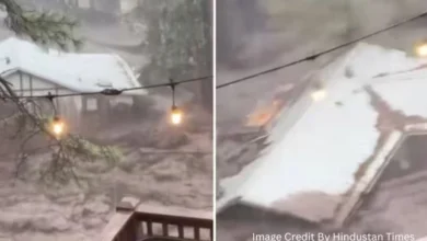 A house being carried away by floodwaters in Ruidoso, New Mexico during the July 2025 flash flood