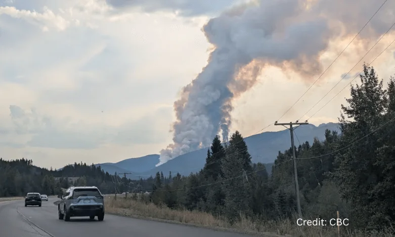 Flames and thick smoke rising near the Coquihalla Highway during the Mine Creek wildfire.