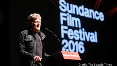 Robert Redford speaking on stage at Sundance Film Festival