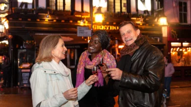 Friends enjoying a night gathering in a city street scene representing Hidden & Underground Events in Metro Vancouver