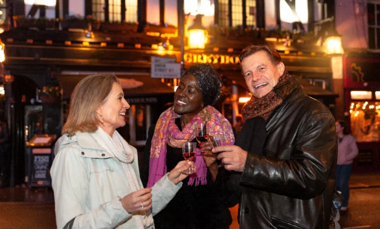 Friends enjoying a night gathering in a city street scene representing Hidden & Underground Events in Metro Vancouver