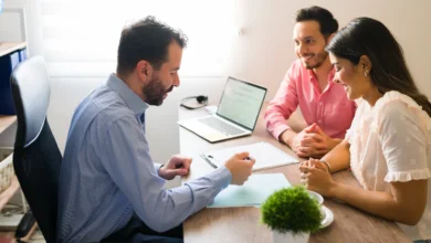insurance near me consultation with broker helping couple choose best insurance plan