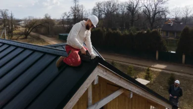 roof replacement cost in Canada metal roofing installation by contractor on residential house